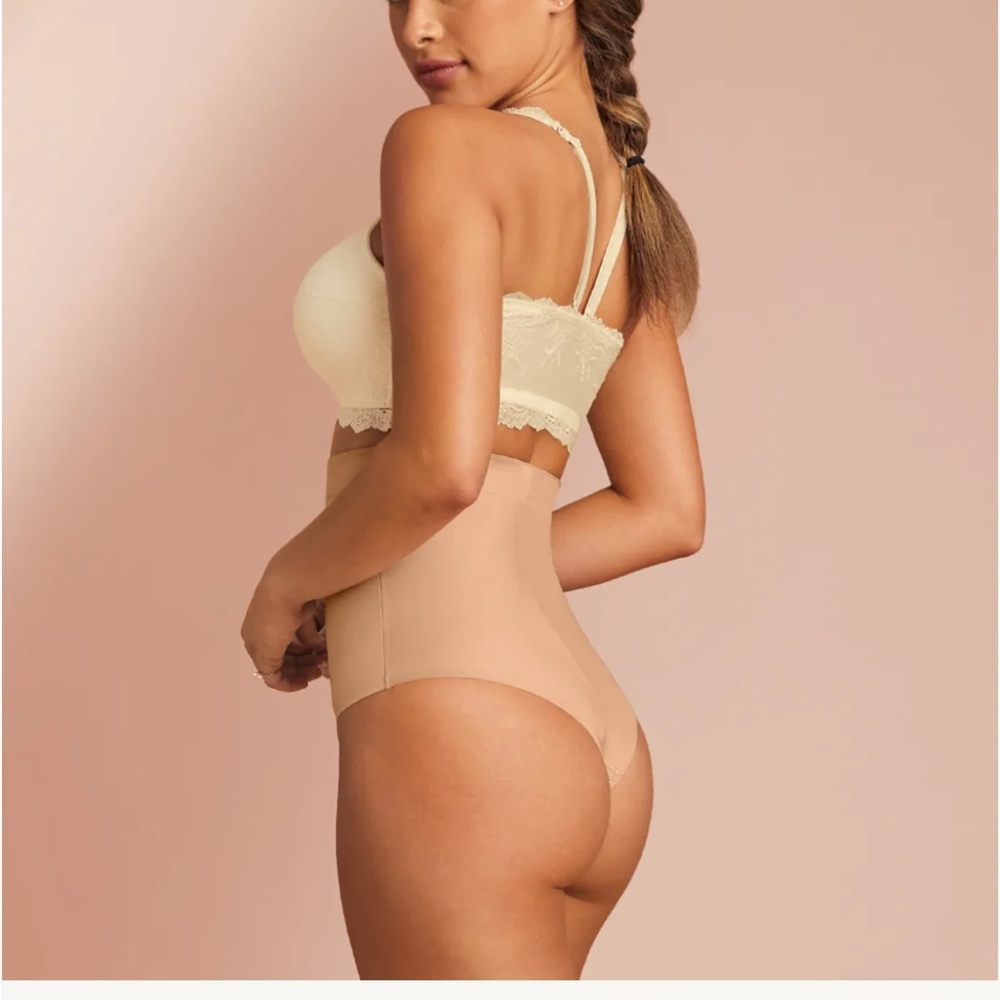 SPANX suit me fancy thong shaper .Small nude